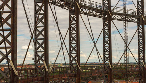 Low angle view of ferris wheel against sky