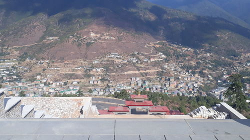 High angle view of townscape and mountains