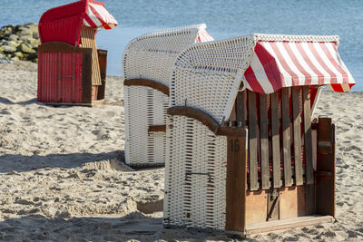 Hooded chairs on beach