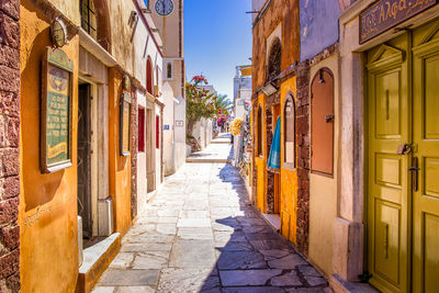 Narrow alley amidst buildings in city