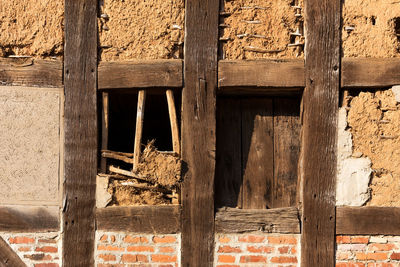 Broken window of old building