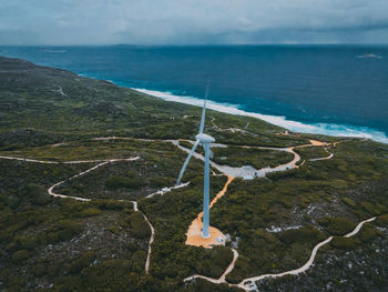 High angle view of sea shore against sky