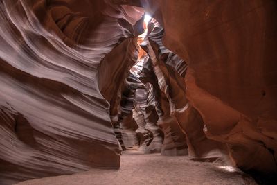 Low angle view of woman in cave