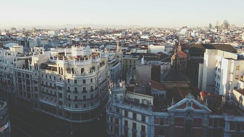 High angle view of buildings in city against sky