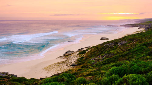 Scenic view of sea against sky during sunset