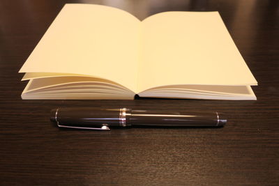 Close-up of open book on table