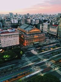 High angle view of illuminated buildings in city against sky