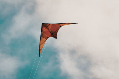 Low angle view of flag against sky