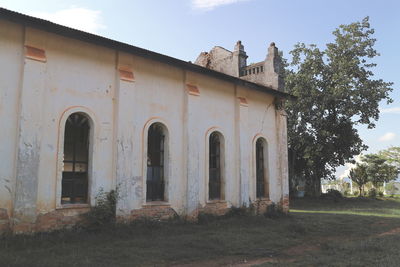 Low angle view of old building against sky