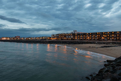 Scenic view of sea against sky at night