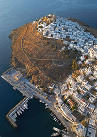 High angle view of city by sea