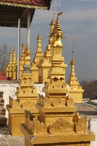 View of temple against building