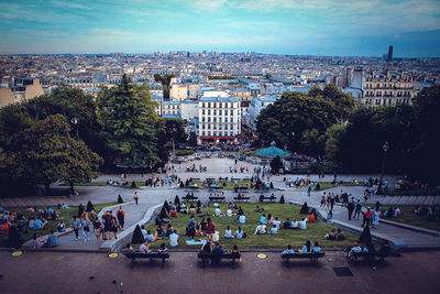 High angle view of people and buildings in city