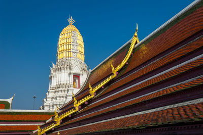 Low angle view of temple building against clear sky
