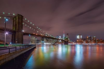 Brooklyn bridge over east river at manhattan at night