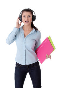 Full length of woman using mobile phone against white background