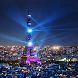 Illuminated buildings in city at night