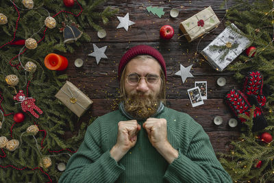 Directly above shot of man wearing christmas tree