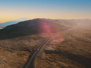 Scenic view of mountains against sky during sunset