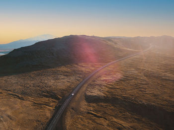 High angle view over scenic road in iceland with one car on the road