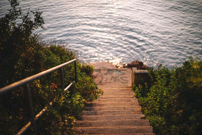 High angle view of footpath by lake