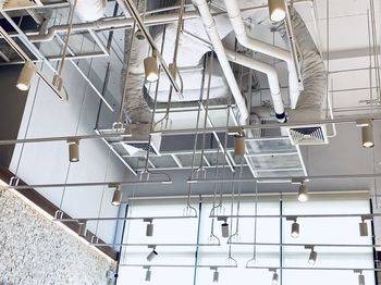 Low angle view of illuminated ceiling