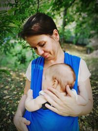 Smiling woman with baby girl