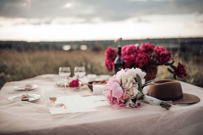 Close-up of pink roses on table