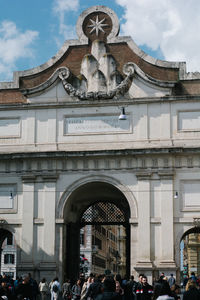 Group of people in front of building