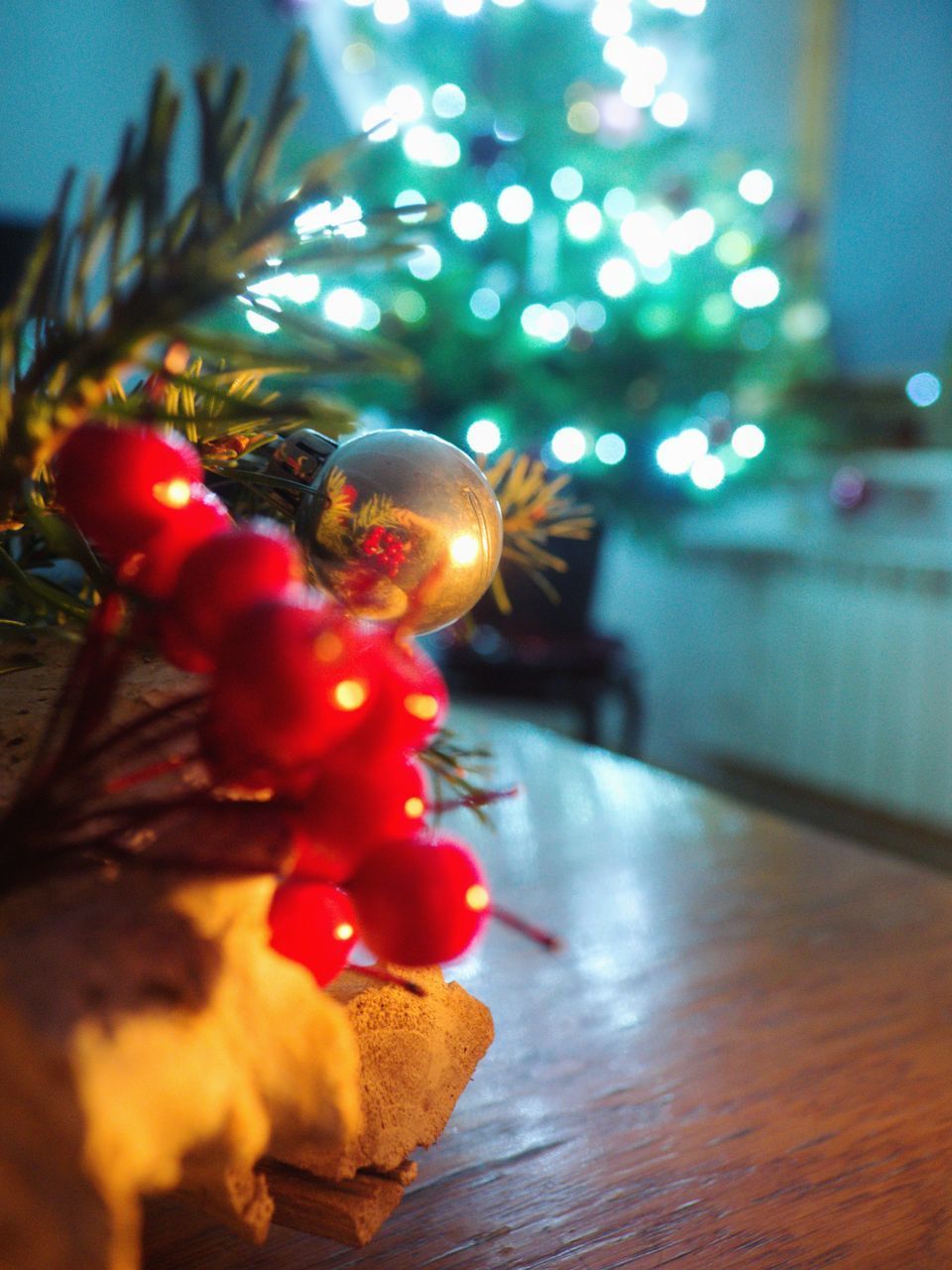 CLOSE-UP OF CHRISTMAS DECORATIONS ON TABLE AT HOME