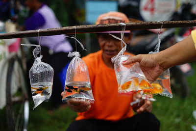 An ornamental fish trader selling his wares on the streets of jakarta