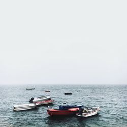 Scenic view of boats in sea