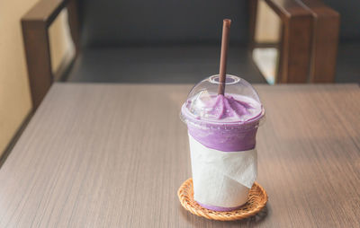 High angle view of drink in glass on table