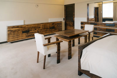 Empty chairs and table at home