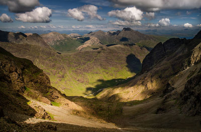 Scenic view of landscape and mountains against sky