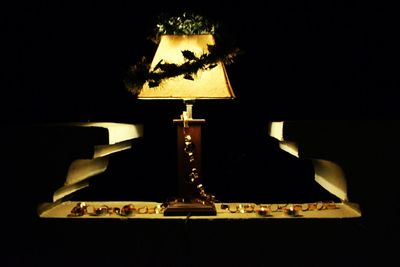 Illuminated electric lamp in dark room