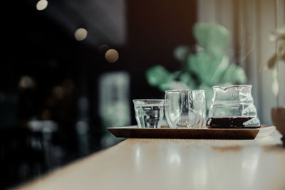 Close-up of empty glass on table at restaurant