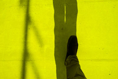 Man standing on tiled floor