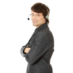 Portrait of a smiling young man against white background