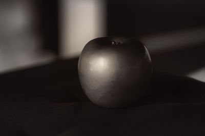 Close-up of apple on table