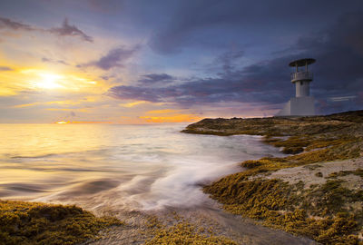 Scenic view of sea against sky during sunset