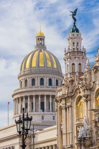 Statue of historic building against sky