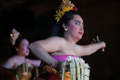 Beautiful woman performing traditional dance