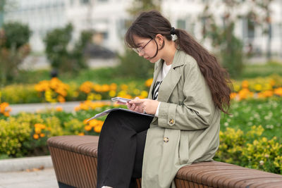 Young woman using mobile phone