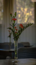 Close-up of flower vase on table