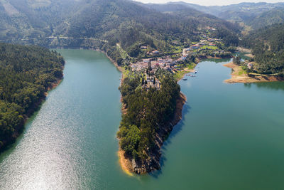 Dornes drone aerial view of city and landscape with river zezere in portugal