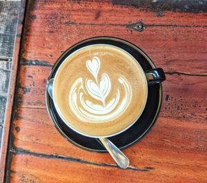 High angle view of cappuccino on table