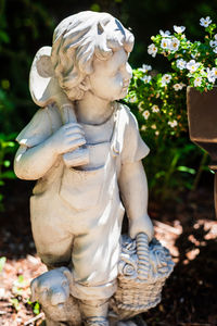 Close-up of angel statue in park