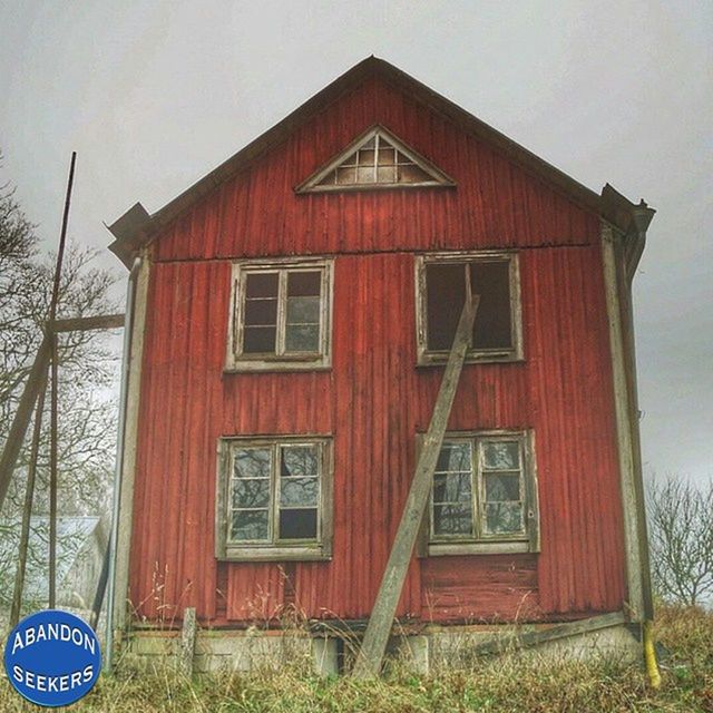 building exterior, architecture, built structure, red, house, closed, door, window, wood - material, safety, day, sky, outdoors, residential structure, security, protection, no people, entrance, field, wooden