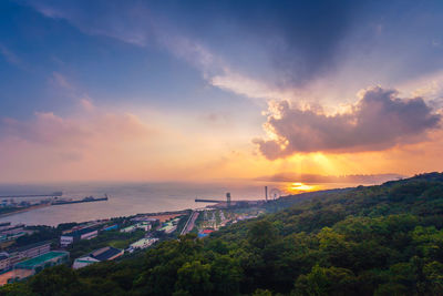 High angle view of sea against sky during sunset